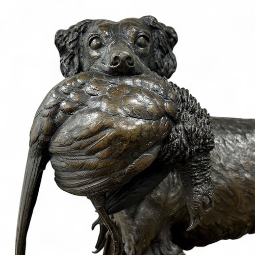 172 - Jules Moigniez (1835-94), a large patinated cast bronze sculpture of a dog holding a pheasant in its... 