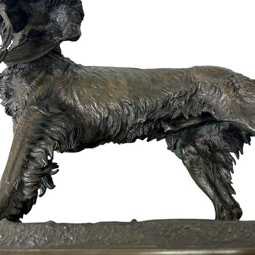 172 - Jules Moigniez (1835-94), a large patinated cast bronze sculpture of a dog holding a pheasant in its... 