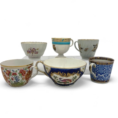 17 - A group of six cups and saucers, the group includes a Samson Paris tea cup and saucer, a fluted Flig... 