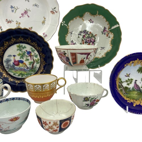 19 - An eclectic group of porcelain, the group includes a red anchor Chelsea plate, a Flight and Barr pla... 