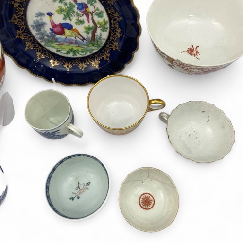 19 - An eclectic group of porcelain, the group includes a red anchor Chelsea plate, a Flight and Barr pla... 