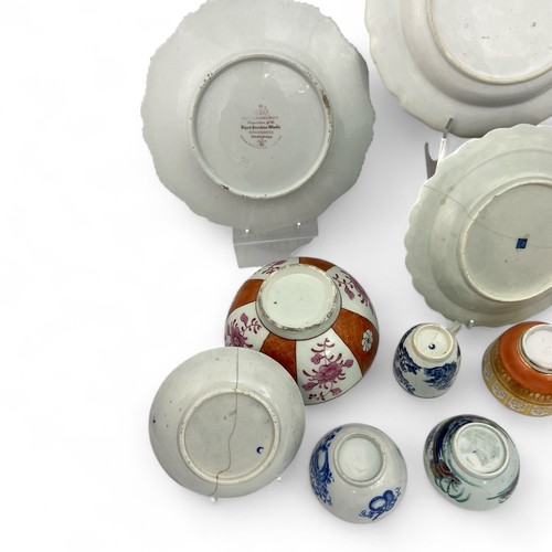 19 - An eclectic group of porcelain, the group includes a red anchor Chelsea plate, a Flight and Barr pla... 