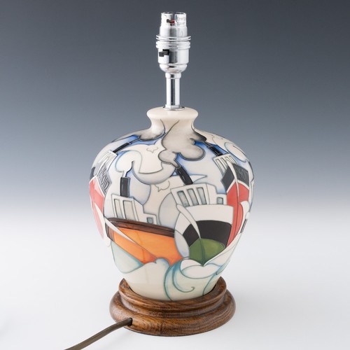 28 - A unique Moorcroft Art Deco style trial table lamp with a pattern of stylised cruise liners or ships... 