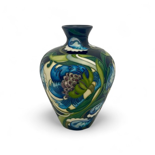 35 - A Moorcroft baluster vase designed by Emma Bossons in 2008 with an unusual and appealing pattern in ... 