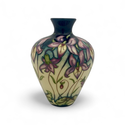 34 - A Moorcroft ‘Queens Meadow’ pattern vase designed by Rachel Bishop in 2007, limited edition 19 out o... 