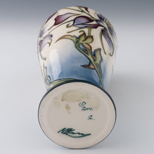 33 - A tall Moorcroft ‘Petals in the Wind’ patten baluster vase designed Nicola Slaney in 2011, numbered ... 