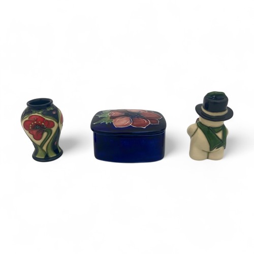 31 - A miniature Moorcroft ‘Ode to a Poppy’ pattern vase designed by Rachel Bishop in 2008, impressed and... 