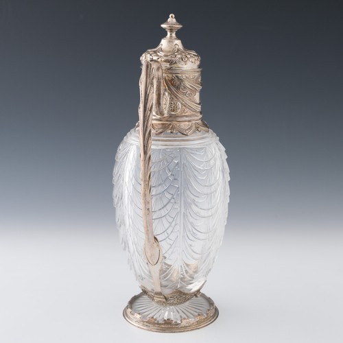 115 - A Victorian silver-mounted cut glass claret jug, the body with graduated, sloping festoon-type curvi... 