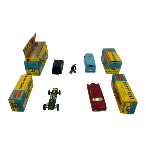 243 - A group of four Corgi Toys, comprising No.448 BMC Mini Police Van With Tracker Dog, with inner picto... 