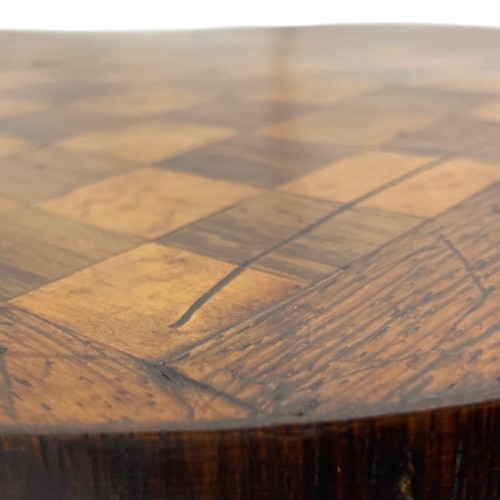 221A - A 19thC miniature table, probably an apprentice's piece, the tilting oak top with chequered 'chessbo... 