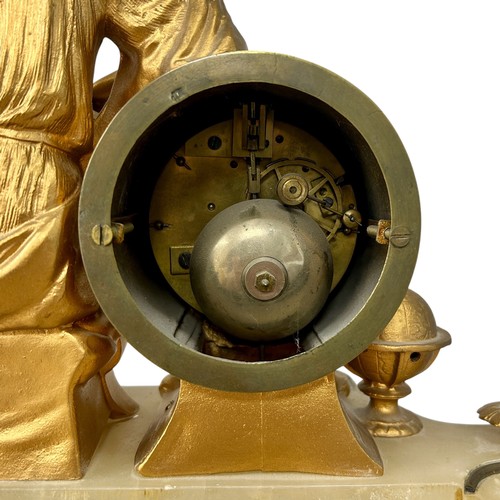 169 - A late 19thC Neoclassical style alabaster and gilt metal clock, with a reclining lady holding calipe... 