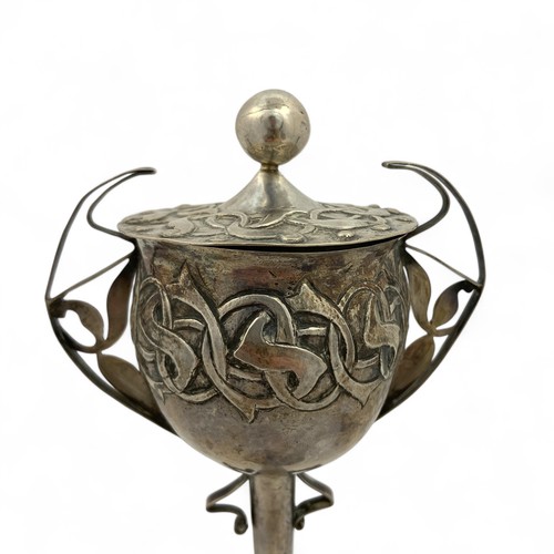 126 - A unique late 19thC or early 20thC Arts & Crafts white metal lidded goblet, the body, lid and fo... 