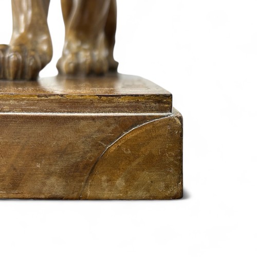 177 - A 1920s-30s French Art Deco carved wood sculpture of a prowling lioness embarking on a hunt, by an u... 