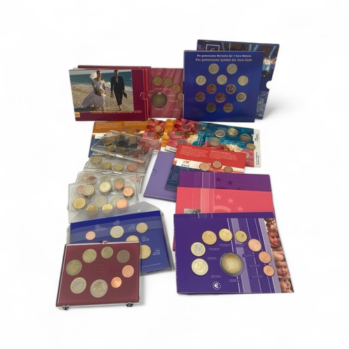 239 - A collection of twenty one proof sets of euros each containing a minimum of three euros and eighty e... 