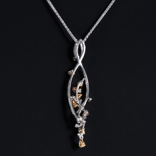 162 - An 18ct white gold curving pendant, claw set with 13 pear-shaped cut fancy yellow diamonds totalling... 