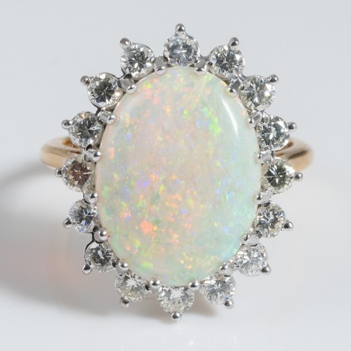 146 - A Boodles 18ct yellow gold, opal and diamond cluster ring, claw set with sixteen 0.07 carat round br... 