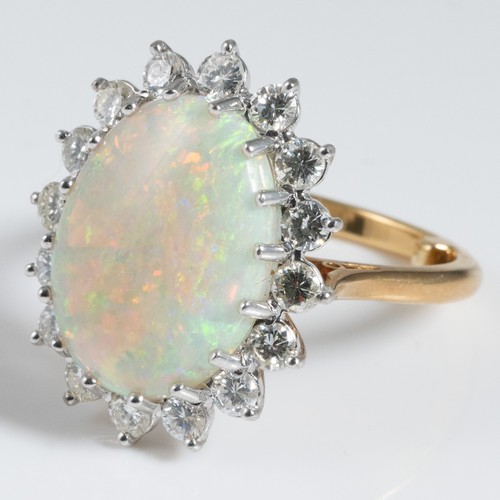 146 - A Boodles 18ct yellow gold, opal and diamond cluster ring, claw set with sixteen 0.07 carat round br... 