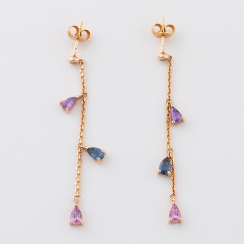 160 - A pair of 18ct rose gold multistone drop earrings, each with three teardrop shaped stones on a chain... 