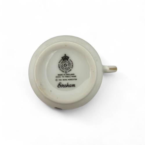 18 - A late 20thC Royal Worcester boxed set of six transfer-printed 'Evesham' pattern lidded coffee cups,... 