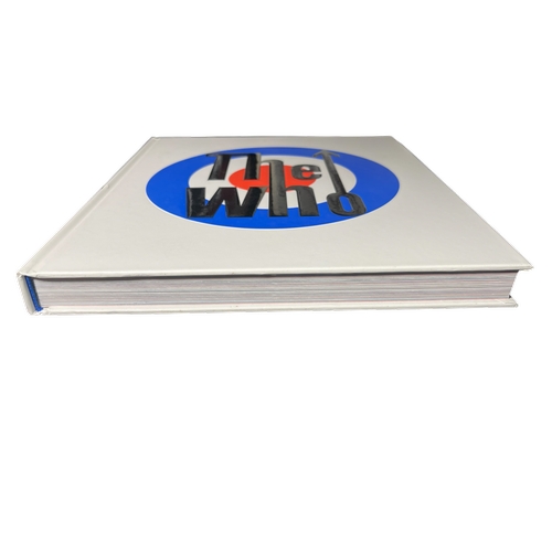 A collection of rock & roll hardback and softback books with photos of ...