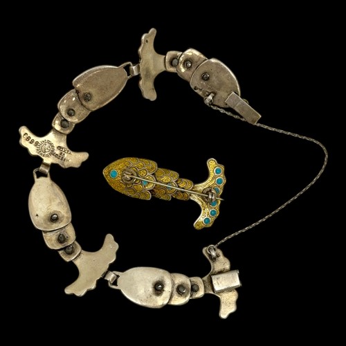175 - A 1950s Margot de Taxco (Margot Van Voorhies Carr) enamelled white metal bracelet and brooch, articu... 