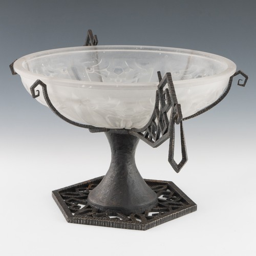 77 - A 1920s Art Deco glass and cast iron table centrepiece, clear and frosted moulded glass body with sa... 