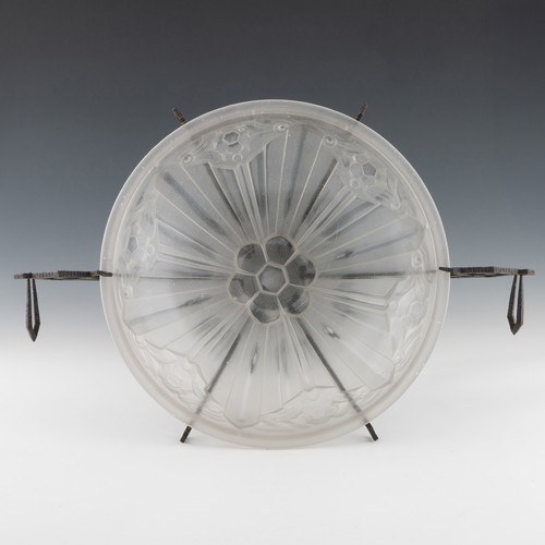77 - A 1920s Art Deco glass and cast iron table centrepiece, clear and frosted moulded glass body with sa... 