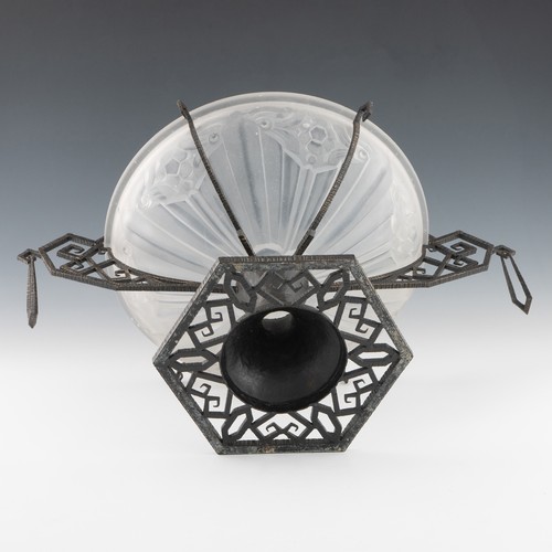 77 - A 1920s Art Deco glass and cast iron table centrepiece, clear and frosted moulded glass body with sa... 
