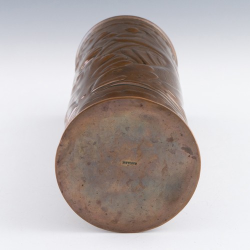 281 - A Newlyn copper vase, c.1905-1910, decorated with two fish amidst seaweed and a wave-form copper riv... 