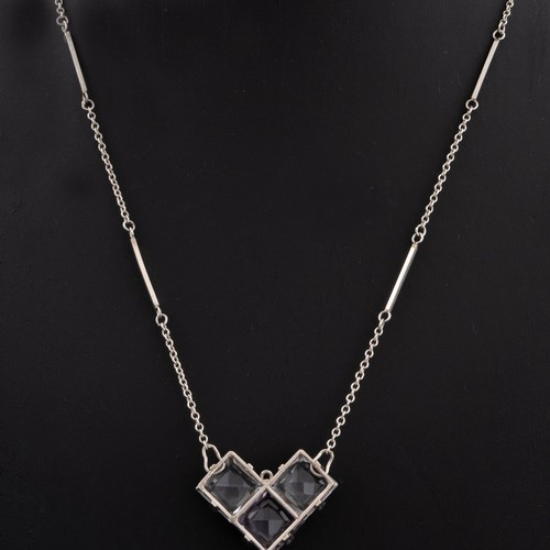 163 - An early Art Deco glass pendant and necklace, c.1930, mounted with three mounted glass squares above... 