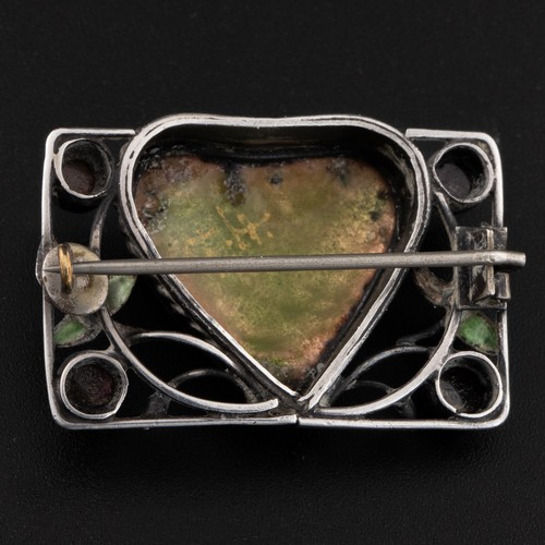 160 - A 1920s enamel and garnet brooch, attributed to George Edward Hunt, rectangular shape decorated with... 