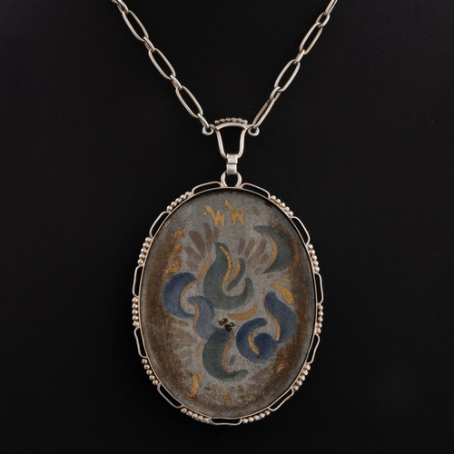 126 - An early 20thC Danish Arts and Crafts hand painted ceramic pendant necklace, decorated with floral d... 