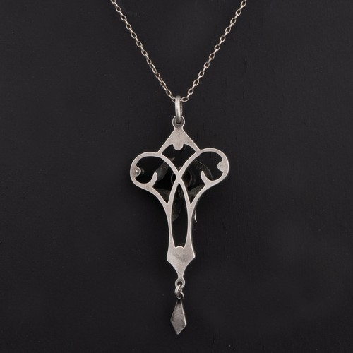 141 - An early 20thC Art Nouveau enamelled pendant, decorated with openwork with polychrome enamels depict... 