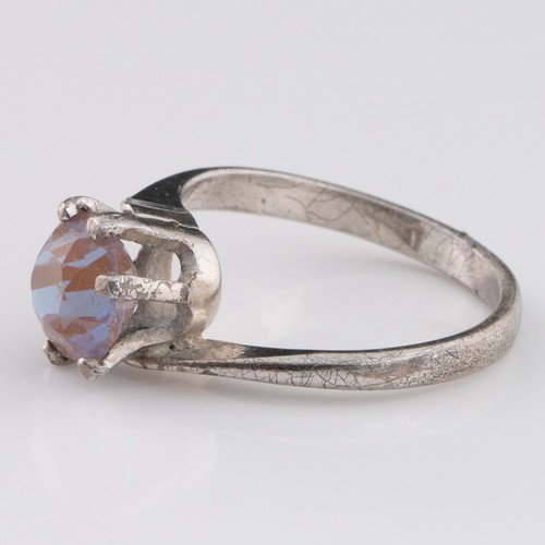 153 - A 1930s Saphiret white metal crossover ring, decorated with Saphiret exhibiting excellent colour cha... 