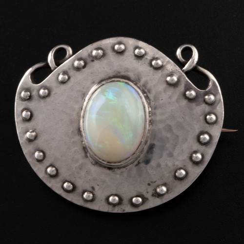98 - A Murrle Bennett Arts and Crafts silver and opal brooch, c.1900, shield-shaped brooch decorated with... 