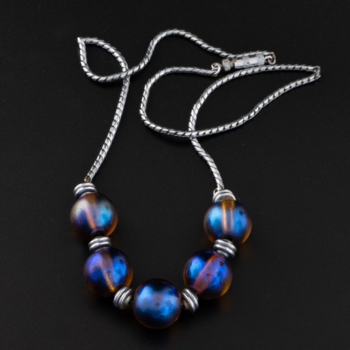 167 - An Art Deco WMF 'Myra-Krystall' necklace, c.1930, decorated with iridescent glass beads in blue, gol... 
