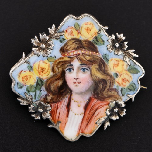 92 - An early 20th century Continental white metal and enamel portrait brooch, with portrait of a young l... 