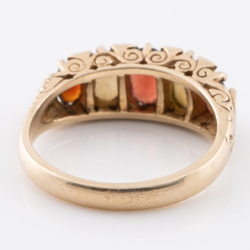 178 - A 9ct gold ring made in London 1973, with opals and garnets, ring size Q. (LC340)