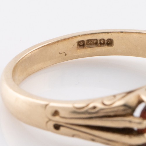 178 - A 9ct gold ring made in London 1973, with opals and garnets, ring size Q. (LC340)