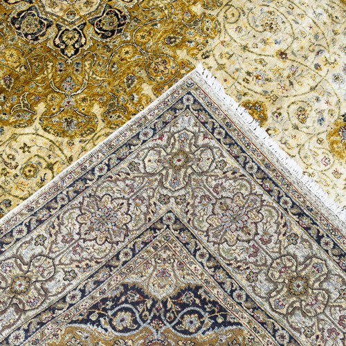 46 - 20th century Indian silk rug, central tiered floral medallion surrounded by botanical sprays and scr... 