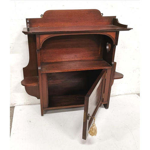 123 - Edw. Mahogany Wall Shelf, with a single central cabinet, inlaid, with heart shaped designs to each s... 