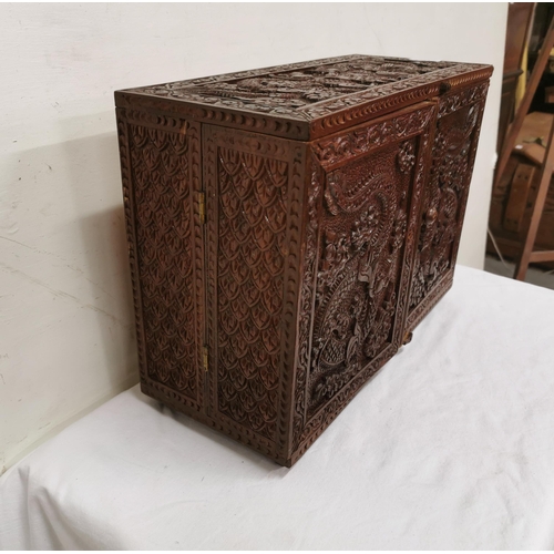 228 - Indonesian Table Box, 2 fold-out doors enclosing several shelves, 30cmH x 42cmW