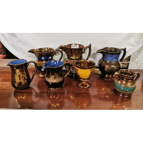 275 - 6 brown glazed water/milk Jugs, English and Welsh, (painted décor) & 1 goblet (7)