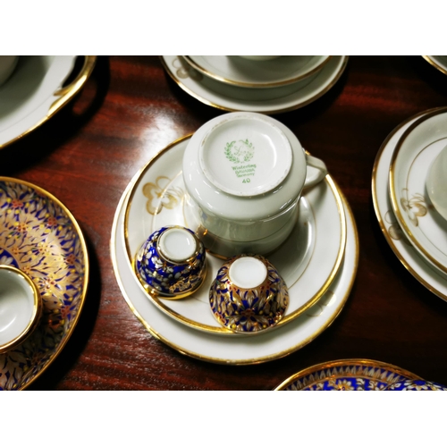 260 - Ornamental Childs Tea Set, blue and white flowers with gilt borders incl. 2 tea pots, 2 plates & a ... 