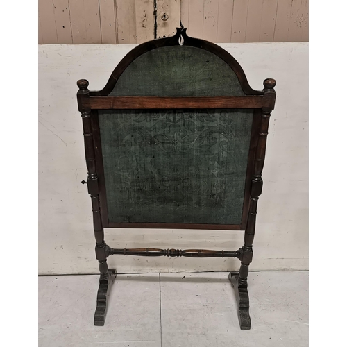 271 - A WMIV Mahogany Framed Fire Screen, height adjustable, the original tapestry panel featuring a figur... 