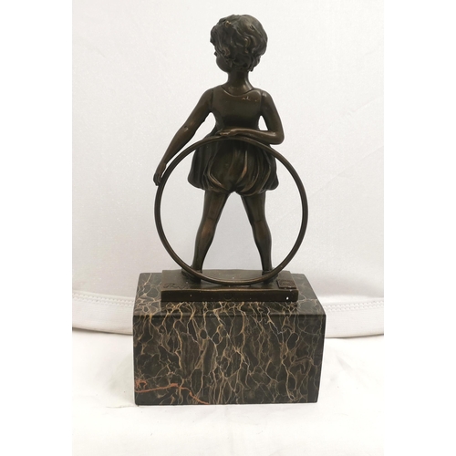 273 - Table bronze figure of a Girl with hoop, on a marble base, stamped France, 26cmH