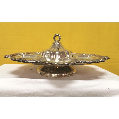 279 - Early 20thC Ornately Bordered Silver Plated Nut/Condiment Dish, a glass dish to each compartment, on... 