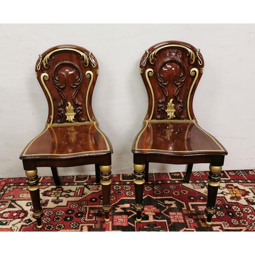 29 - Matching Pair of Antique Mahogany Hall Chairs, the curved backs featuring raised acanthus mouldings,... 