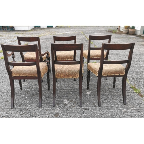 30 - Set of 6 Regency Mahogany Framed Dining Chairs, with rail backs, the tops carved with floral motifs,... 