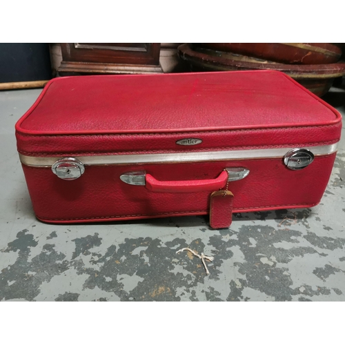 322 - Two Steamer Trunks, brown and blue ply with wooden bands  & a Vintage red Antler suitcase (3)